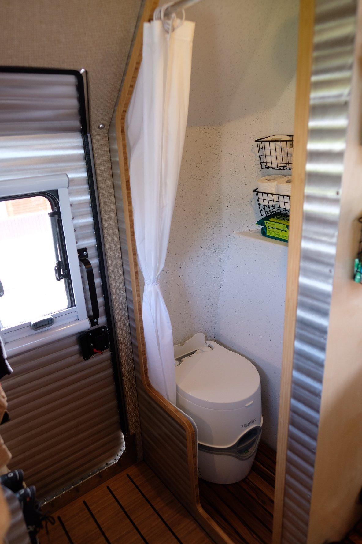 Bath storage, toilet, and a window